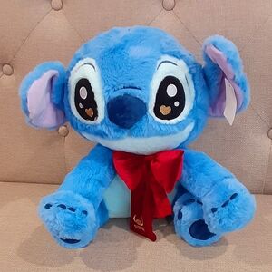 Stitch  Plush Wearing A Red Bow Tied Around His Neck 35cm